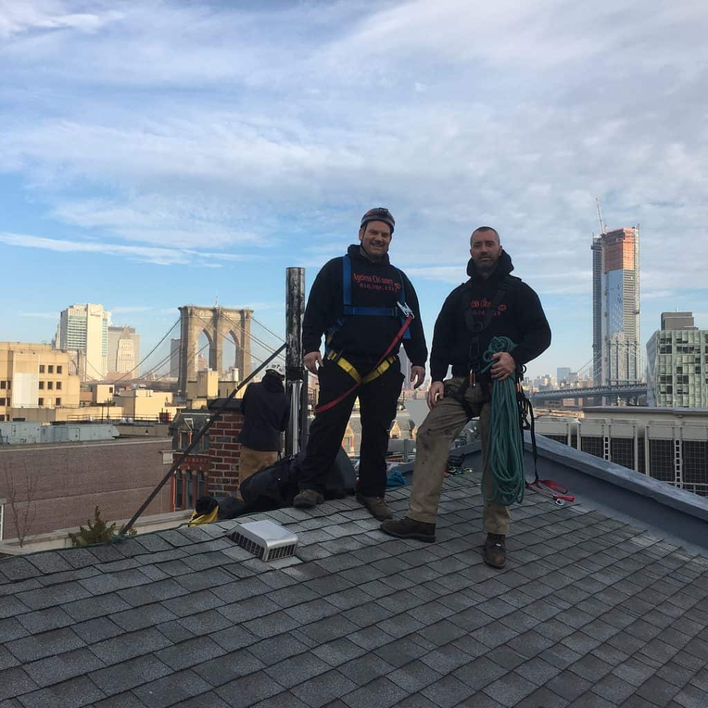 2 guys on a roof