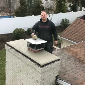 Chimney Cleaning Man Rooftop Suffolk County New York