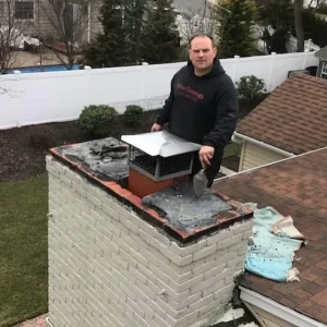Man Fixing Chimney Rooftop Suffolk County New York